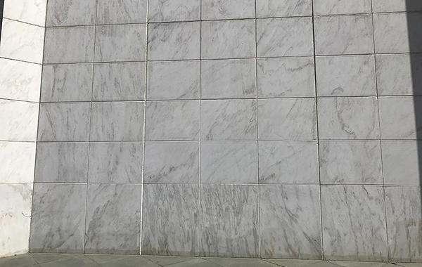 Restoring a white marble facade