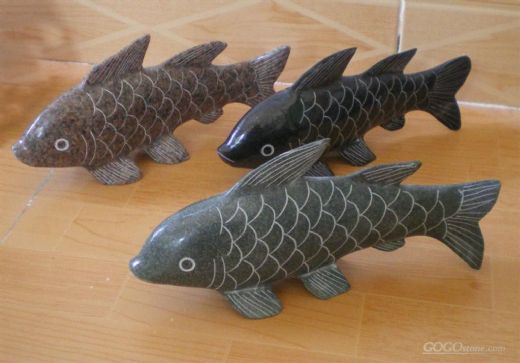 Granite fish carvings 